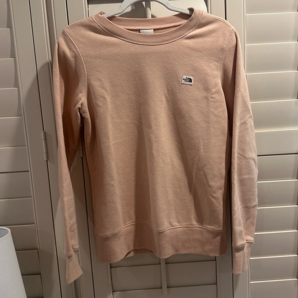 Woman’s Salmon Colored North Face Crewneck
